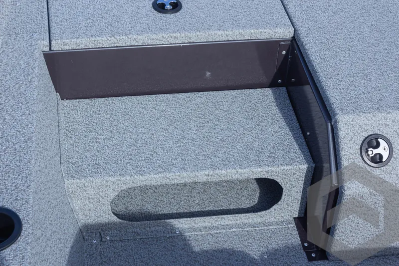 Slide: The Image of 2025 G3 Sportsman 1710 boat interior with textured flooring and storage compartments. - 20
