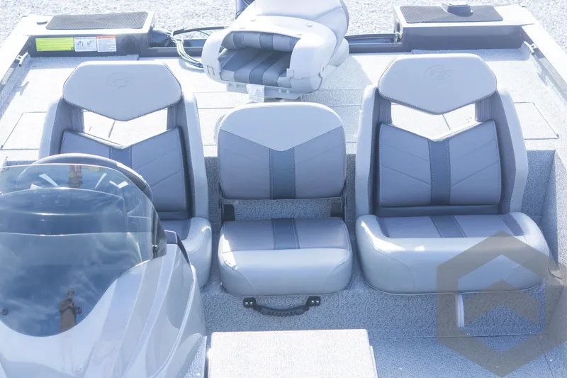 Slide: The Image of 2025 G3 Sportsman 1710 boat interior with three gray seats. - 31