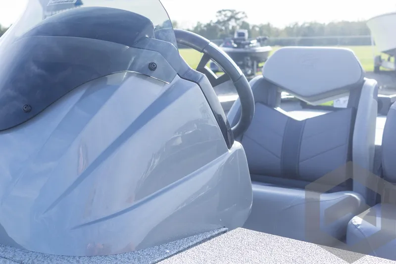Slide: The Image of 2025 G3 Sportsman 1710 boat interior with steering wheel and seating. - 32