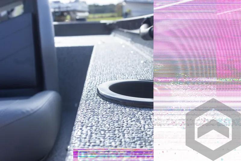 Slide: The Image of 2025 G3 Sportsman 1710 boat interior with textured flooring and seating. - 34