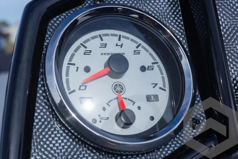 Slide: The Image of Close-up of 2025 G3 Sportsman 1710 dashboard with tachometer and fuel gauge. - 38