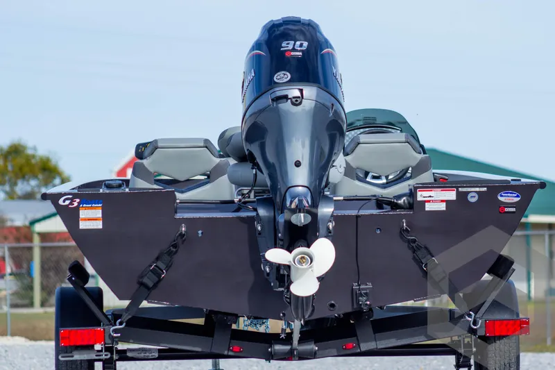 Slide: The Image of 2025 G3 Sportsman 1710 boat with outboard motor on trailer. - 4