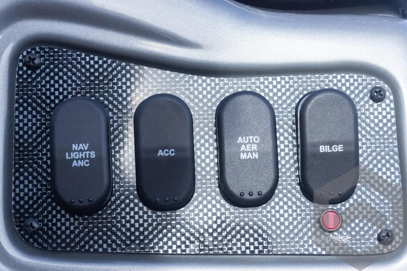 Slide: The Image of Control panel of 2025 G3 Sportsman 1710 boat with switches for navigation, accessories, aerator, and bilge. - 42