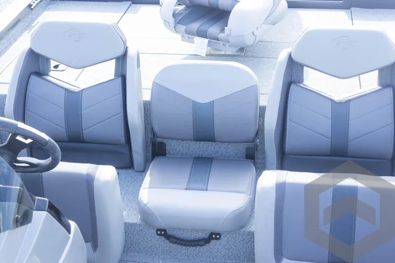 Slide: The Image of 2025 G3 Sportsman 1710 boat interior with gray seating arrangement. - 45