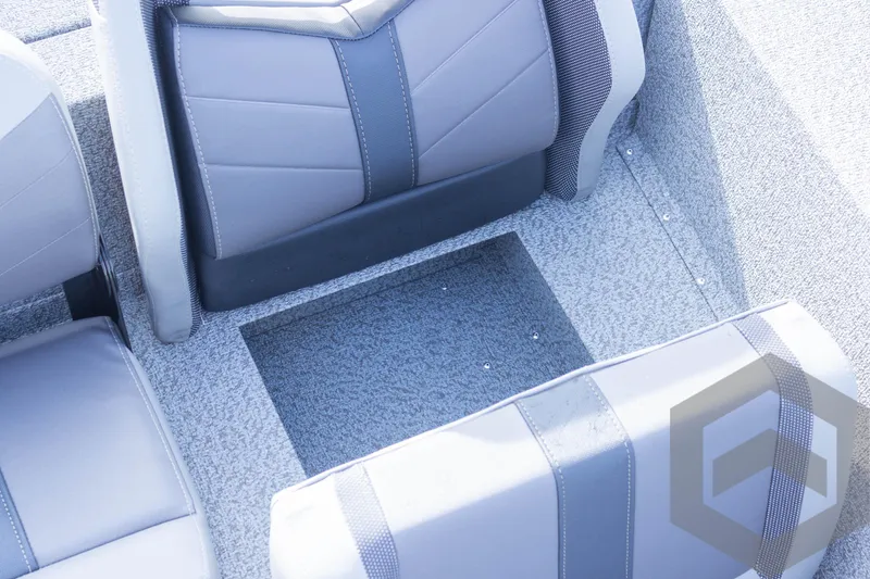 Slide: The Image of 2025 G3 Sportsman 1710 boat interior with gray seating and carpeted flooring. - 46
