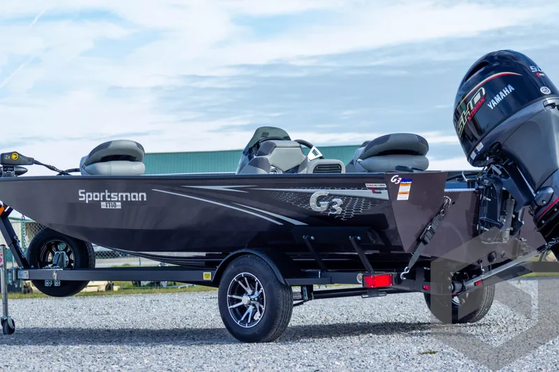 Slide: The Image of 2025 G3 Sportsman 1710 boat with Yamaha motor on a trailer. - 5