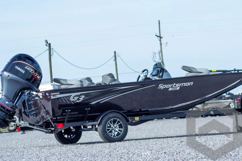 Slide: The Image of 2025 G3 Sportsman 1710 boat with Yamaha engine on trailer. - 6