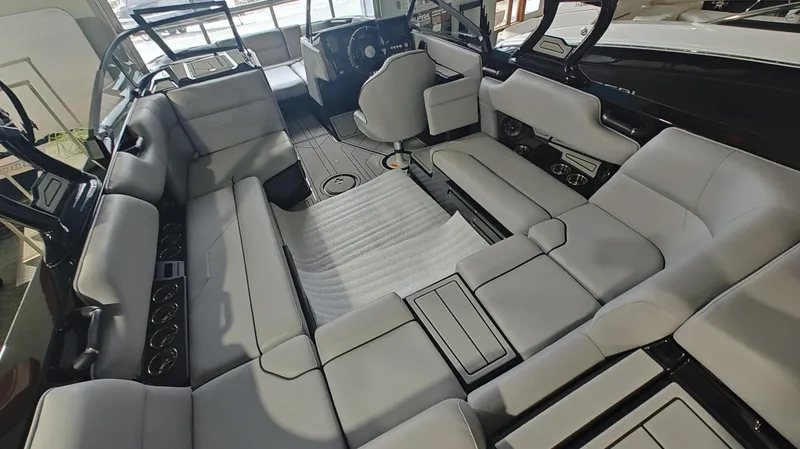Slide: The Image of 2025 Moomba Max boat interior with spacious seating and modern design. - 17