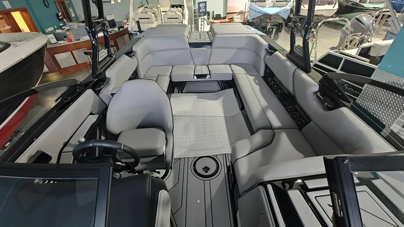 Slide: The Image of 2025 Moomba Max boat interior with spacious seating and modern design. - 20
