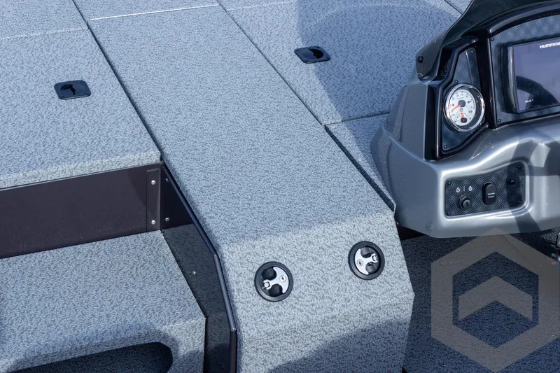 Slide: The Image of 2025 G3 Sportsman 1910 boat interior with dashboard and textured flooring. - 21