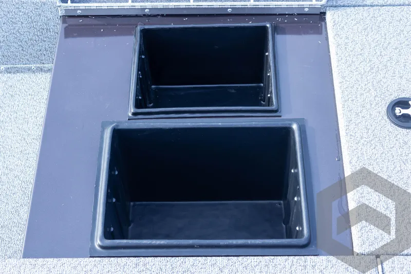 Slide: The Image of 2025 G3 Sportsman 1910 boat storage compartments, open and empty. - 27
