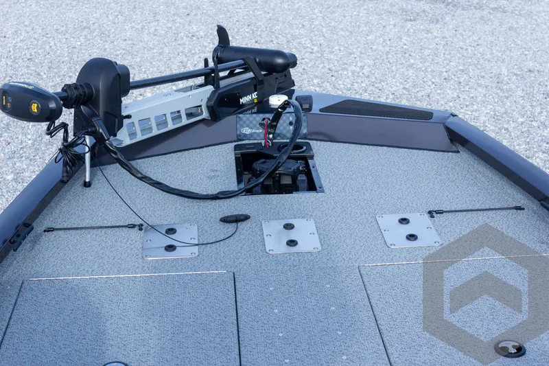 Slide: The Image of 2025 G3 Sportsman 1910 boat deck with trolling motor and storage compartments. - 31