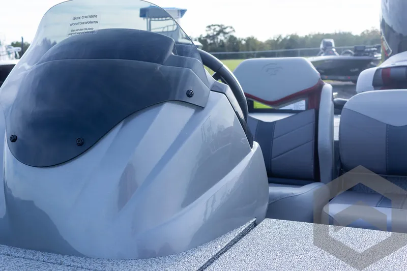 Slide: The Image of 2025 G3 Sportsman 1910 boat interior with steering wheel and seating. - 37