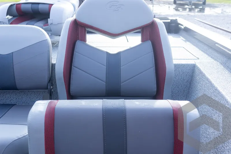 Slide: The Image of 2025 G3 Sportsman 1910 boat seats with red and gray upholstery. - 39