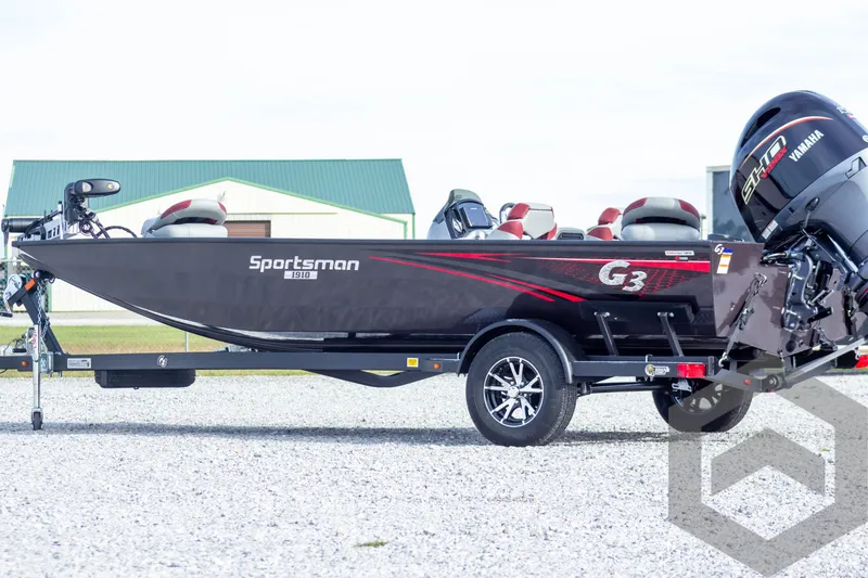 Slide: The Image of 2025 G3 Sportsman 1910 boat with Yamaha motor on gravel surface. - 6
