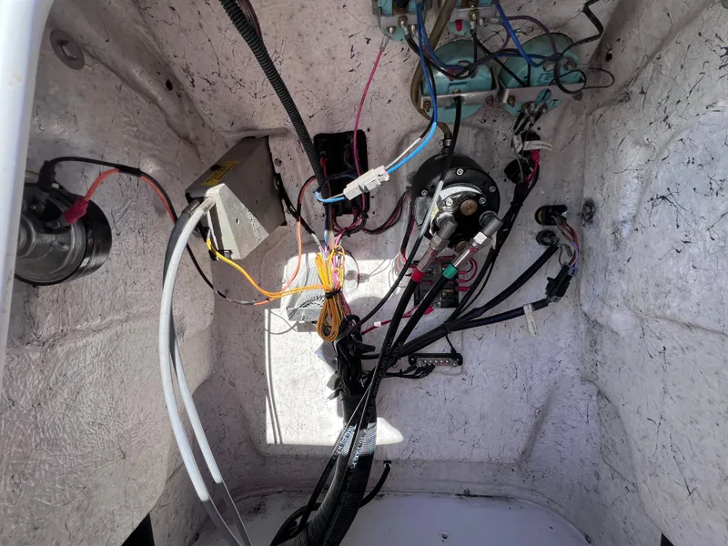 Slide: The Image of 2021 Glasstream 180 CC Mercury 115 wiring and components interior view. - 24