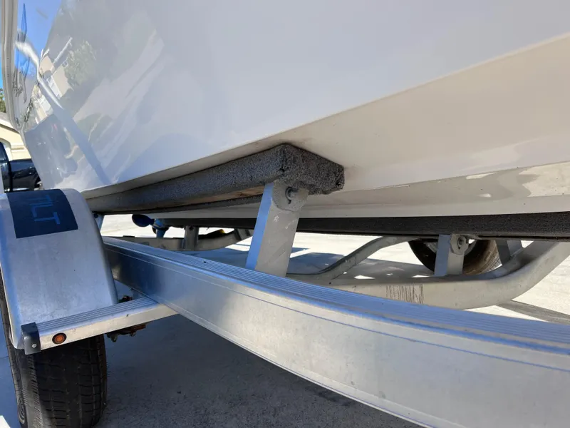 Slide: The Image of 2021 Glasstream 180 CC boat on trailer, close-up view of hull and support. - 33