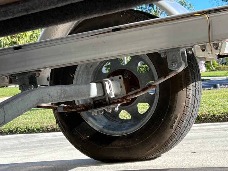 Slide: The Image of Trailer wheel of 2021 Glasstream 180 CC Mercury boat, close-up view. - 34