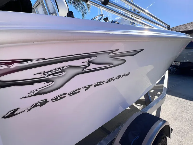 Slide: The Image of 2021 Glasstream 180 CC boat with Mercury 115 engine, side view. - 9