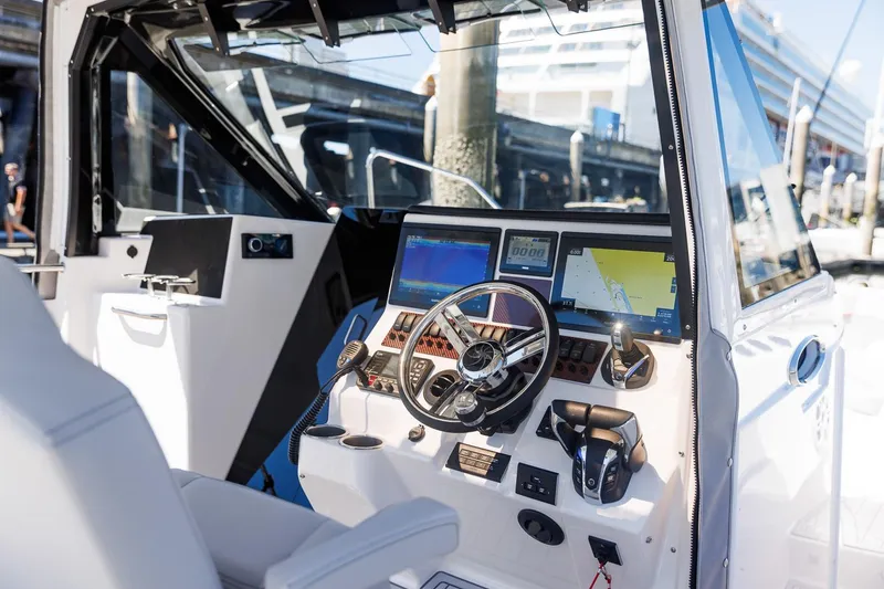 Slide: The Image of Interior of 2025 Solara S-310 CW boat with advanced navigation system. - 14