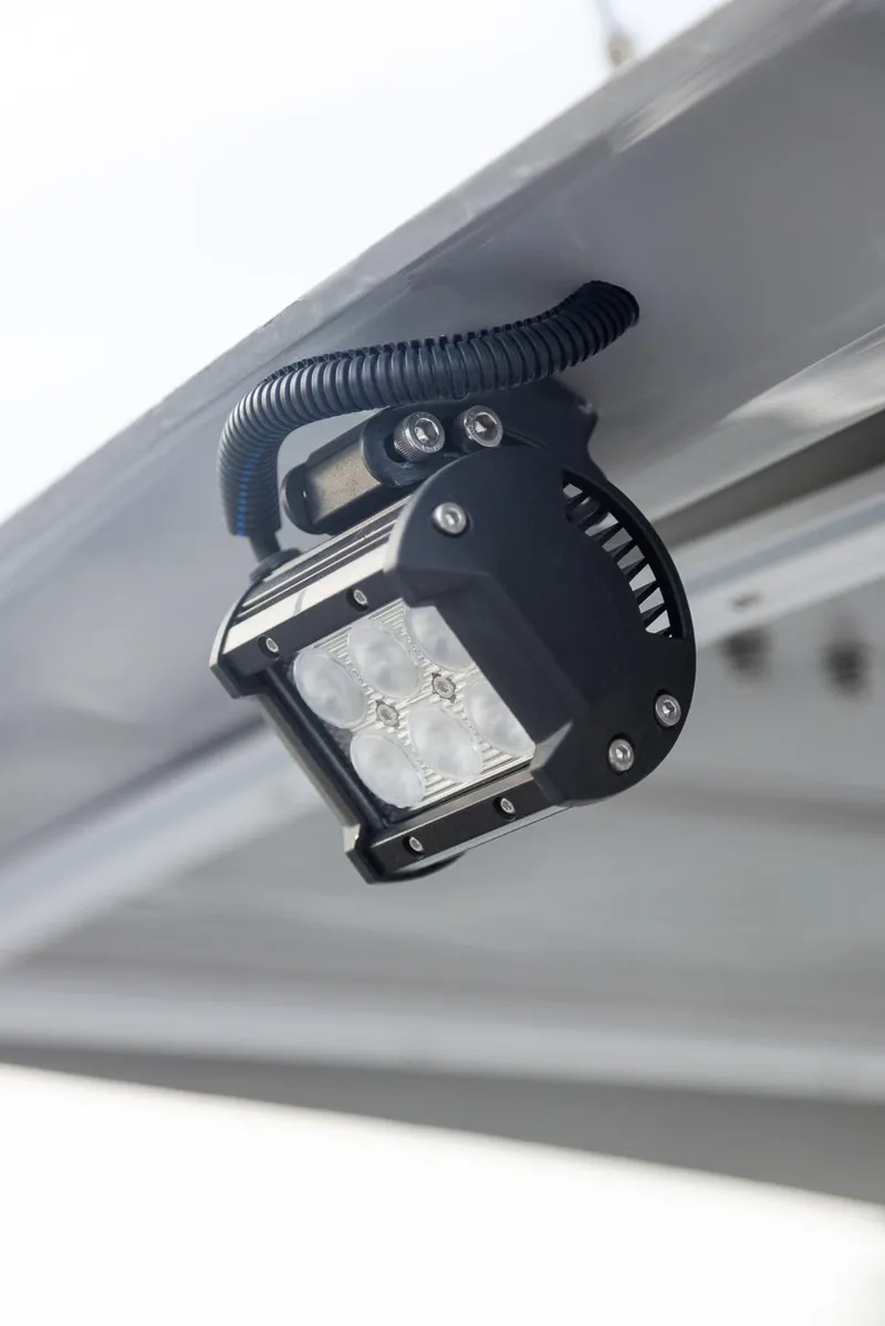 Slide: The Image of Solara S-310 CW 2025 LED light fixture mounted on a metal surface. - 31