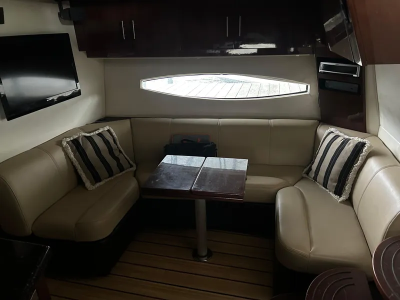 Slide: The Image of Luxurious interior of 2014 Regal 44 Sport Coupe with leather seating and modern decor. - 13