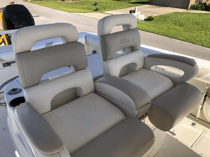 Slide: The Image of 2004 Boston Whaler 32 Outrage boat seats, featuring plush, ergonomic design. - 22