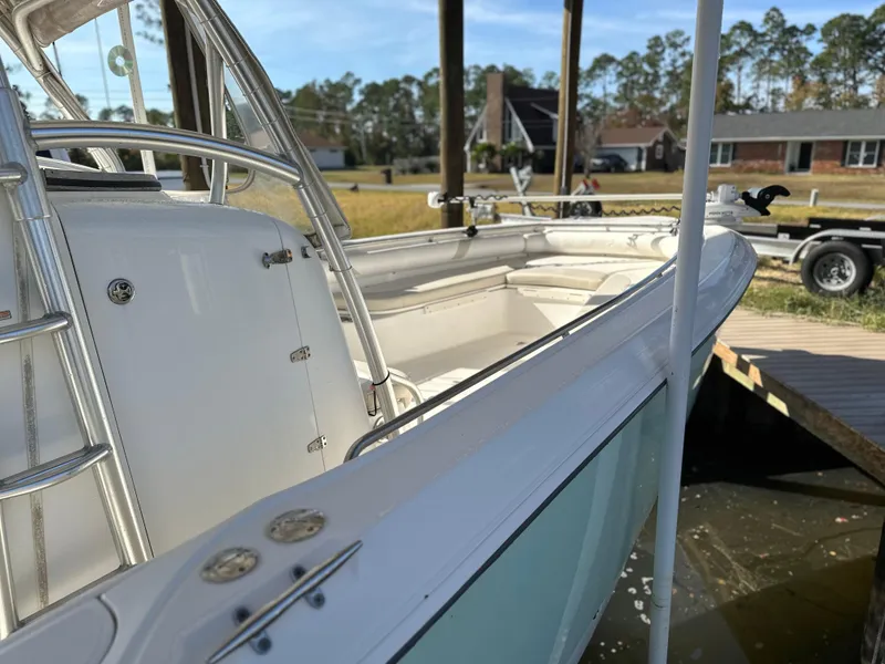 Slide: The Image of 2004 Boston Whaler 32 Outrage boat docked near residential area. - 6
