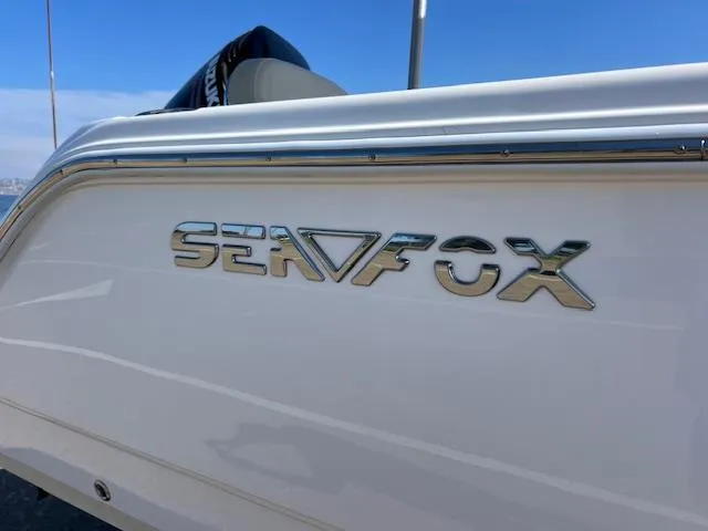 Slide: The Image of 2018 Sea Fox 248 Commander boat with logo on the side. - 22