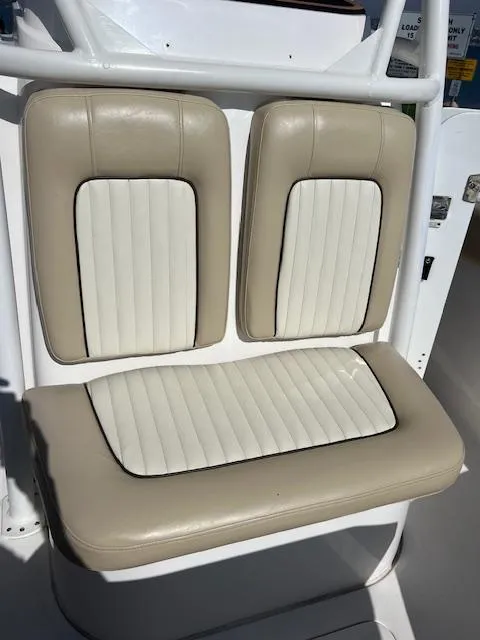 Slide: The Image of 2018 Sea Fox 248 Commander boat seats, beige and white upholstery. - 26