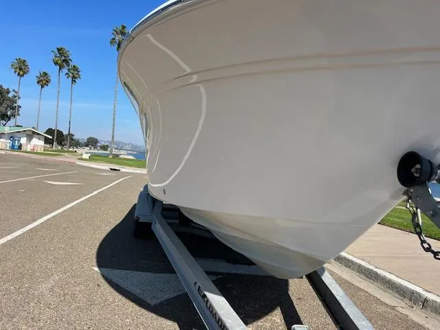 Slide: The Image of 2018 Sea Fox 248 Commander boat on trailer in sunny parking lot. - 5
