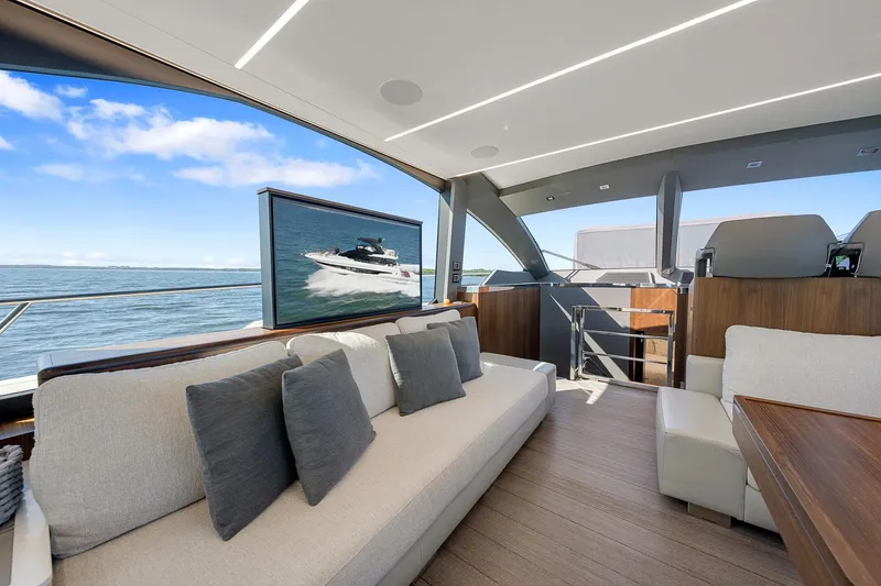 Slide: The Image of Luxurious interior of 2022 Astondoa 66 yacht with ocean view and modern seating. - 14