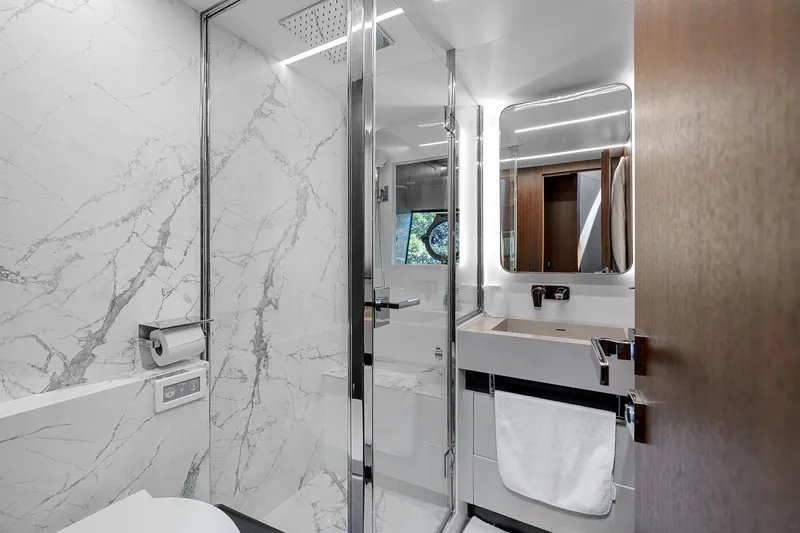 Slide: The Image of Luxurious bathroom in 2022 Astondoa 66 yacht with marble walls and modern fixtures. - 19