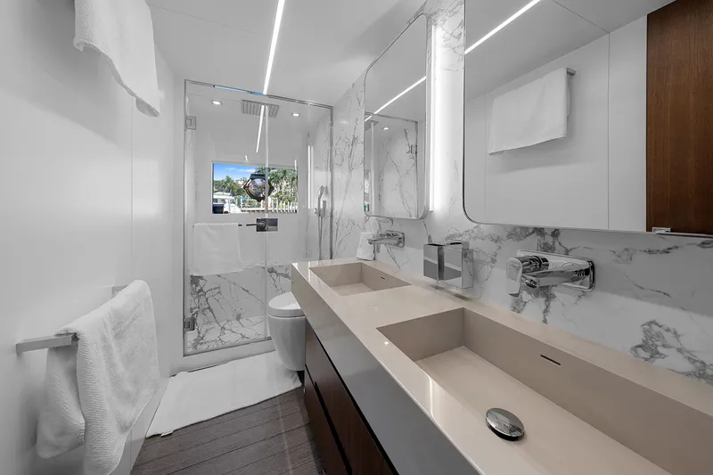 Slide: The Image of Luxurious bathroom in 2022 Astondoa 66 yacht with marble accents and modern fixtures. - 25