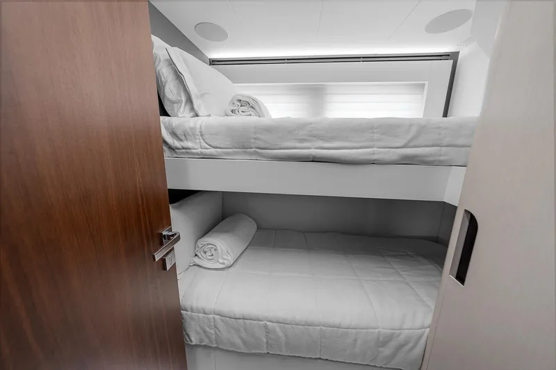 Slide: The Image of Astondoa 66 yacht 2022 interior with cozy bunk beds and modern design. - 26