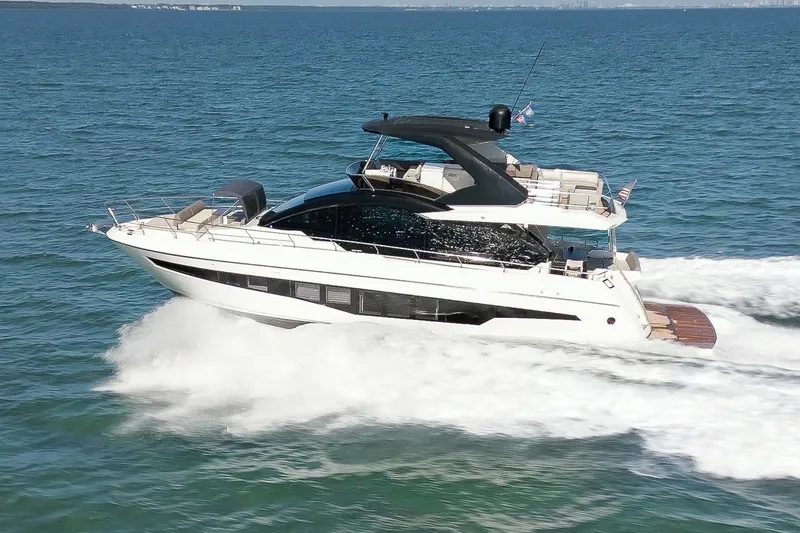 Slide: The Image of 2022 Astondoa 66 yacht cruising on open water. - 3