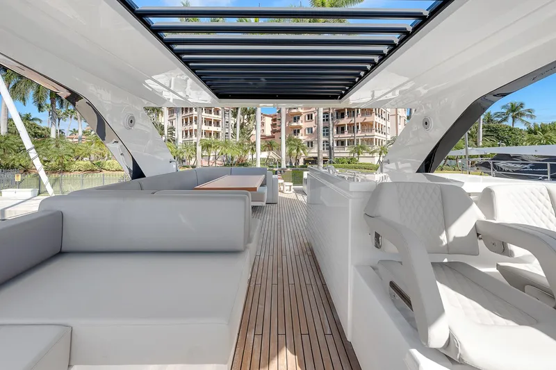 Slide: The Image of Luxurious 2022 Astondoa 66 yacht interior with sleek seating and modern design. - 30