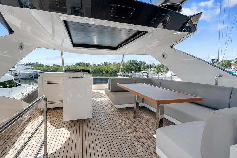 Slide: The Image of Luxurious 2022 Astondoa 66 yacht deck with modern seating and sleek design. - 39