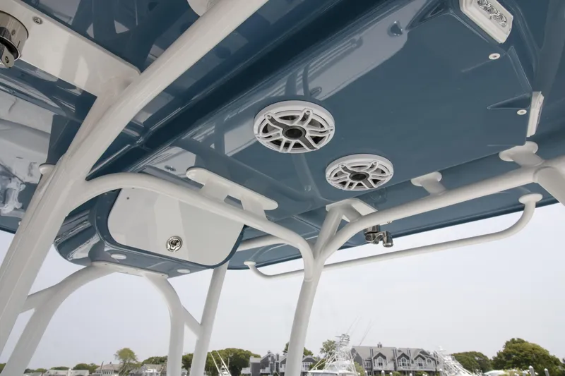 Slide: The Image of 2025 Yellowfin 26 Hybrid boat's overhead view with speakers and sleek design. - 25