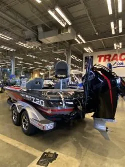 Slide: The Image of 2025 Nitro Z20 XL Pro boat displayed in showroom with sleek design and powerful engine. - 2