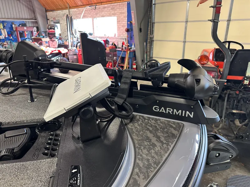 Slide: The Image of 2025 Nitro Z20 XL Pro boat with Garmin equipment in a garage setting. - 12