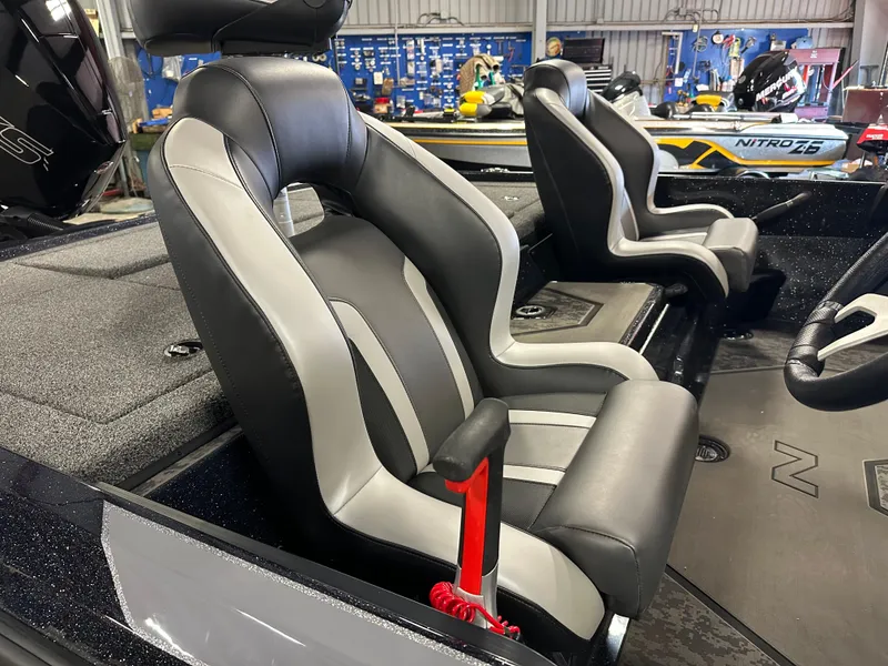 Slide: The Image of 2025 Nitro Z20 XL Pro boat seats in a sleek, modern design inside a workshop. - 7