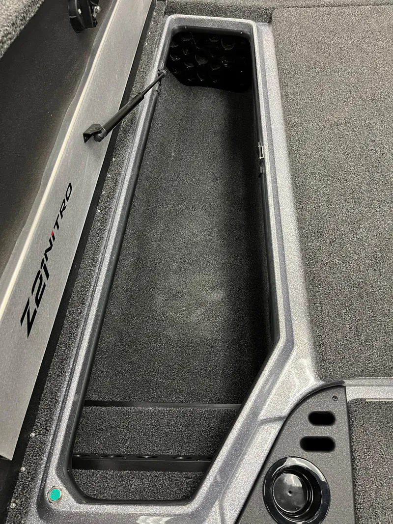 Slide: The Image of 2025 Nitro Z21 XL boat storage compartment with sleek design and durable materials. - 13