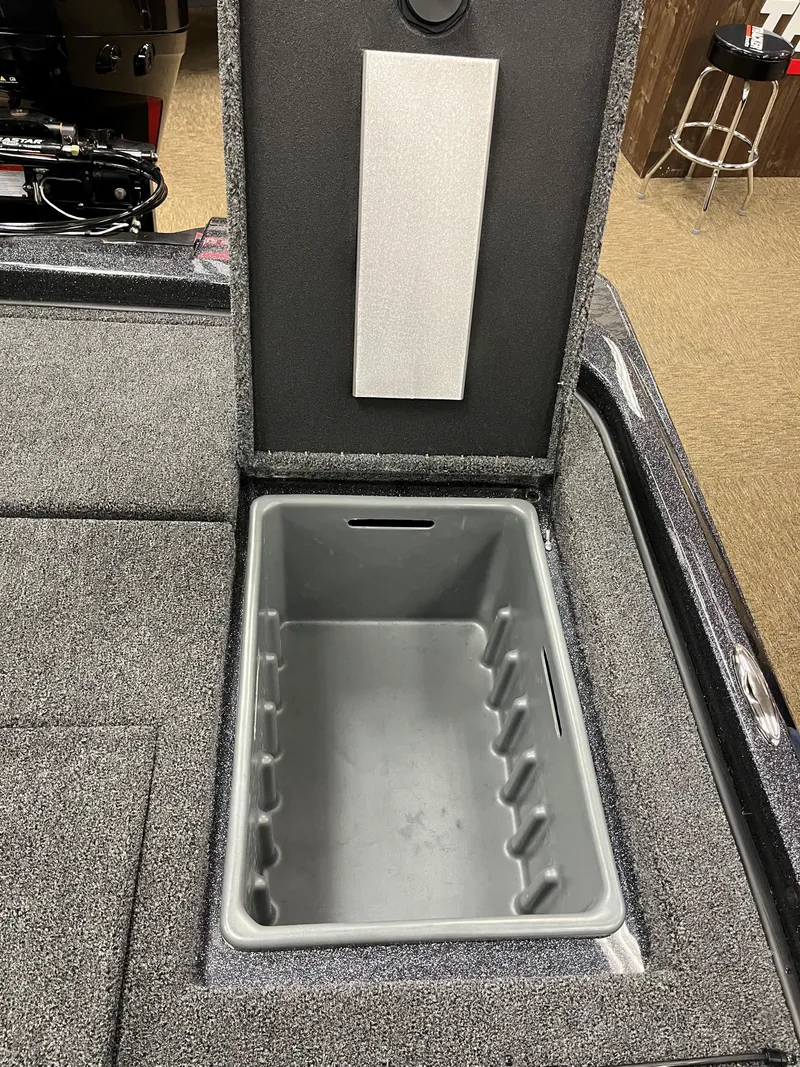 Slide: The Image of 2025 Nitro Z21 XL boat storage compartment with open lid. - 15