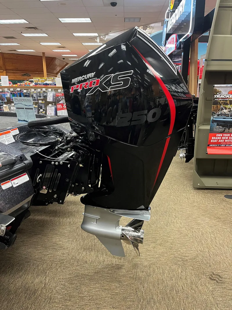 Slide: The Image of 2025 Nitro Z21 XL with Mercury Pro XS 250 outboard motor in showroom. - 5