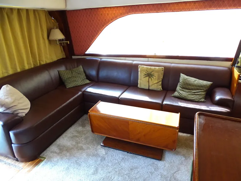 Slide: The Image of Luxurious interior of 1987 Ocean Yachts 48 with leather seating and elegant decor. - 10