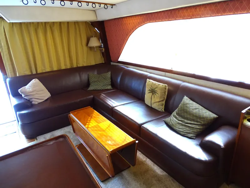 Slide: The Image of Luxurious interior of 1987 Ocean Yachts 48 with leather seating and elegant decor. - 14