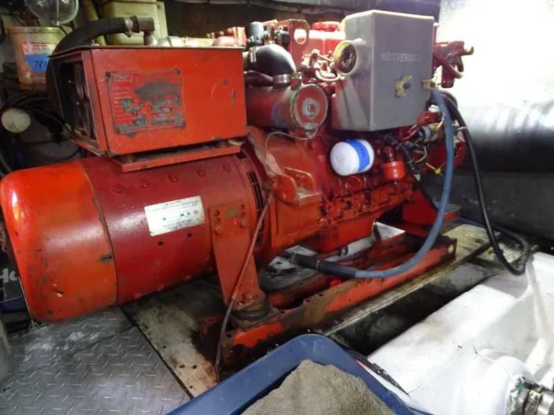 Slide: The Image of Red engine in 1987 Ocean Yachts 48, detailed view of mechanical components. - 28