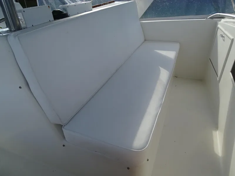 Slide: The Image of White seating area on 1987 Ocean Yachts 48 boat. - 33