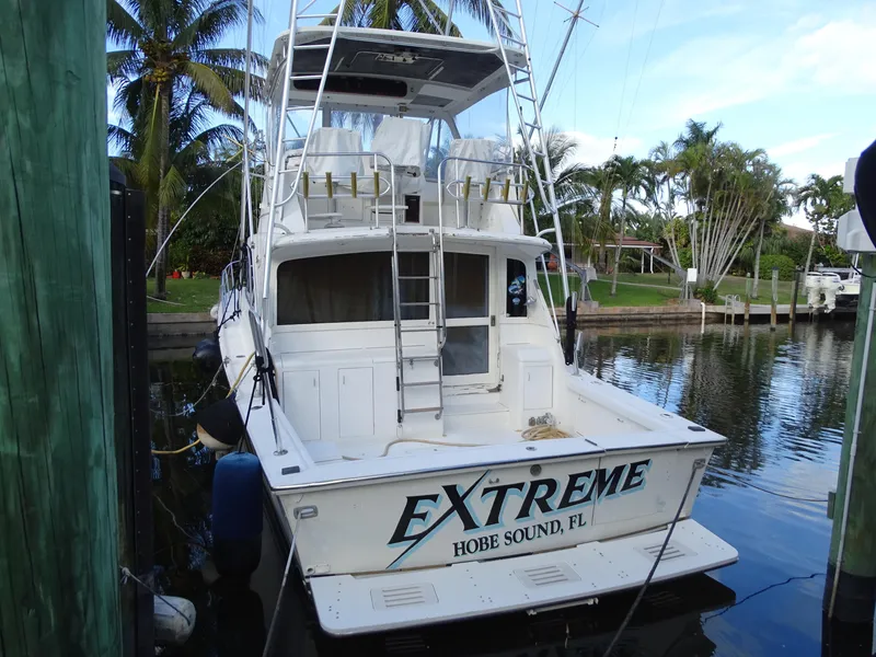 Slide: The Image of 1987 Ocean Yachts 48 docked, rear view, "Extreme" name, Hobe Sound, FL. - 8